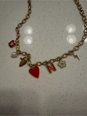 Womens gold nebraska charm necklace